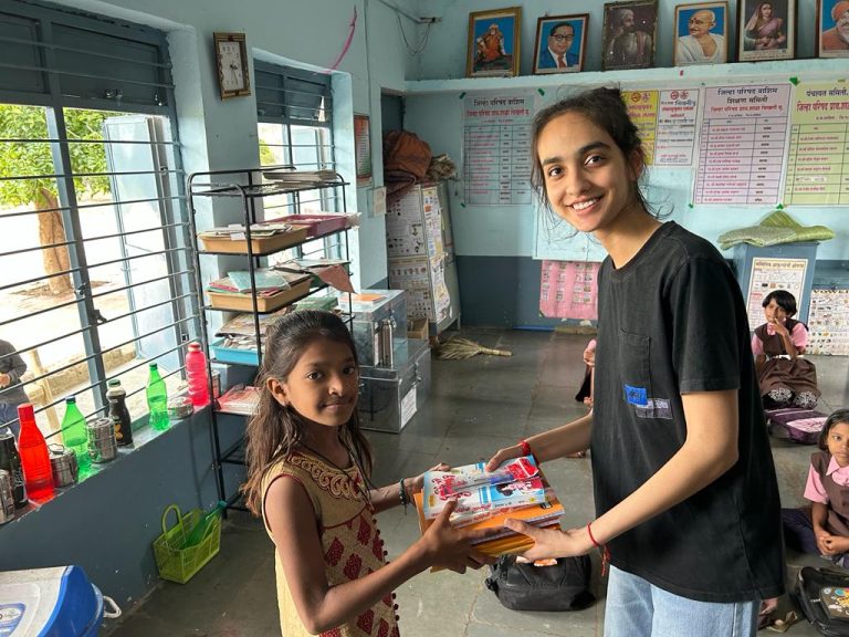 Giving study pack bought through funds raised by selling my poems compilation